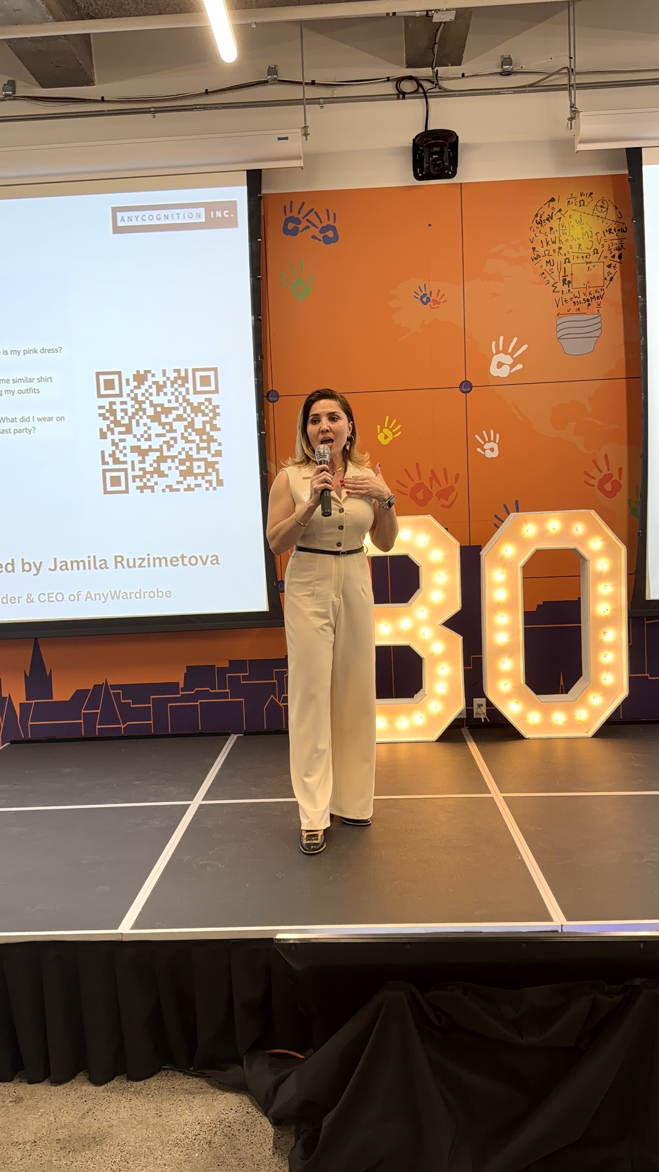 Jamila Ruzimetova pitching at IO Ignition Cohort 30 Pitch Finale